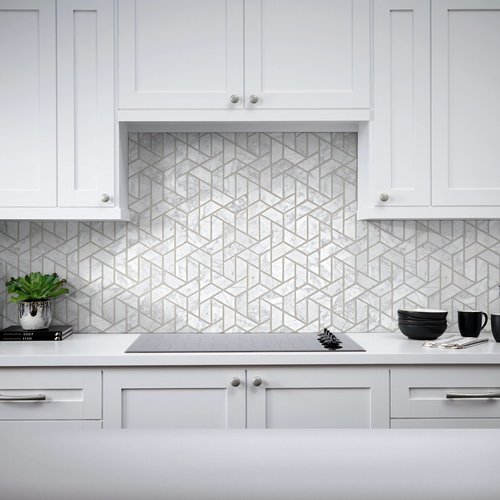 Kitchen with white cabinets and a white tiled backsplash from Scott's Flooring in Barrie, ON