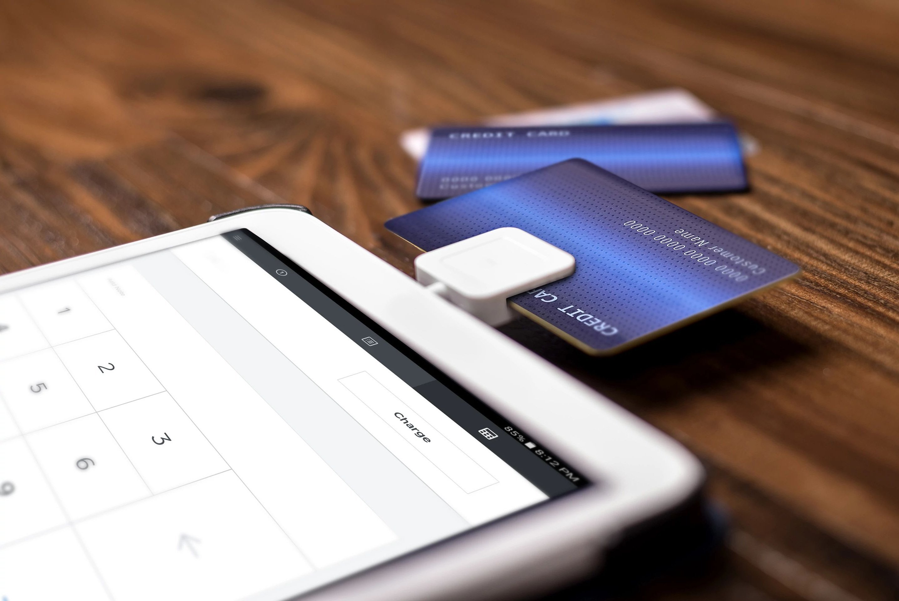 Tablet with a card machine plugged in - Fast and easy finance options from Scott's Flooring in Barrie, ON
