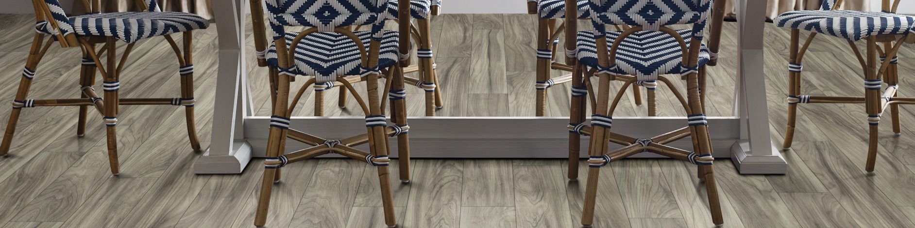 woven dining chairs around a dining table - from Scotts Flooring in Barrie