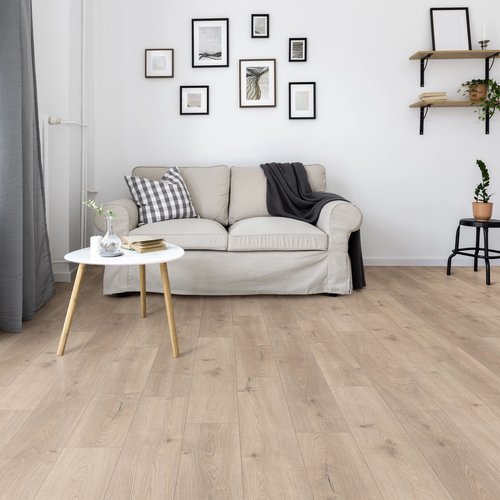 Living room with wood-look laminate flooring from Scott's Flooring in Barrie, ON