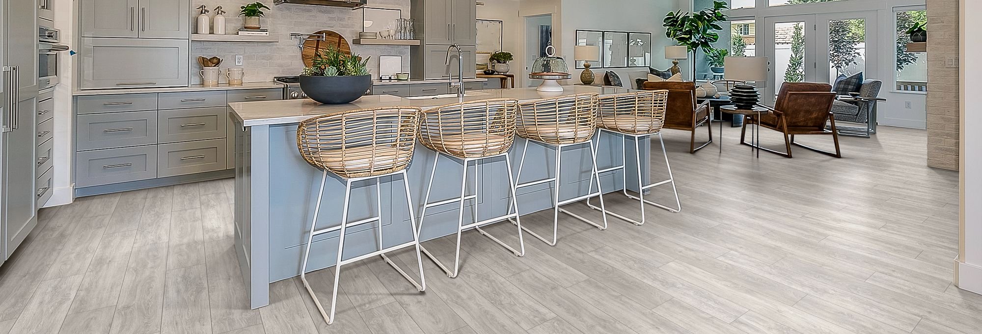 Kitchen dining area with wood-look laminate flooring from Scott's Flooring in Barrie, ON